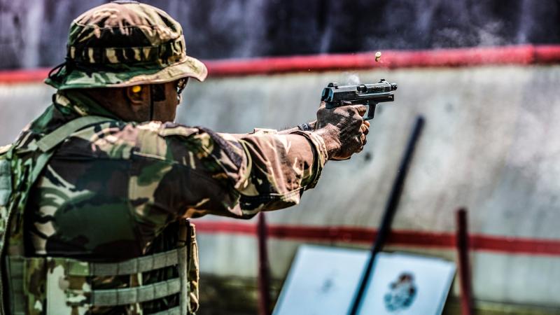 A member from the Papua New Guinea Defence Force participates in a combined activity with members of the other forces at the live-fire range in Sydney before embarking on Exercise Kokoda Wantok. Photos: Corporal Sagi Biderman