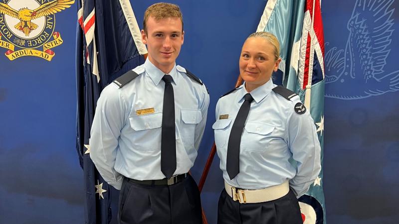 Aircraftman Blair Andrews, left, graduates No. 1 Recruit Training Unit as part of Course 11/22, attended by his mother, right, Aircraftwoman Brodie Andrews at RAAF Base Wagga. Photo:  Squadron Leader Matt Kelly