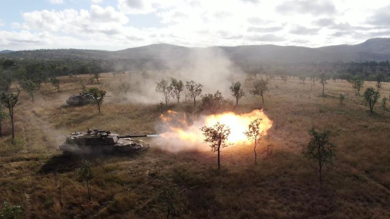 Soldiers from the 2nd Cavalry Regiment fire the M1 Abrams tank during a manoeuvre serial on Exercise Brolga Sprint at Townsville field training area, Queensland. Photo: Bombardier Guy Sadler