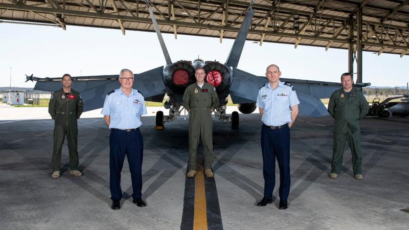 Members of the Centenary Flypast Team, from left, Squadron Leader Jason Gamlin, Group Captain Tim Sloane, Squadron Leader Chris Rogers, Flight Sergeant Tim Muehlberg and Flight Lieutenant James Denton. Photo: Leading Aircraftwoman Emma Schwenke