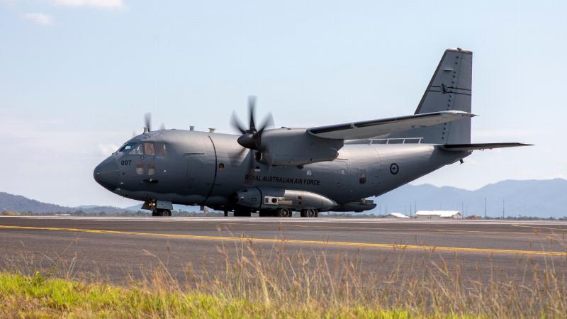 A RAAF C-27J Spartan aircraft takes part in a combat offload activity as part of Exercise Rajawali Ausindo 2022 at RAAF Base Townsville. Photos: Leading Aircraftwoman Annika Smit