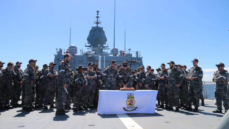 HMAS Toowoomba's ship's company celebrate the ship's 17th birthday in Cockburn Sound, Western Australia. Photo: Leading Seaman Rappard