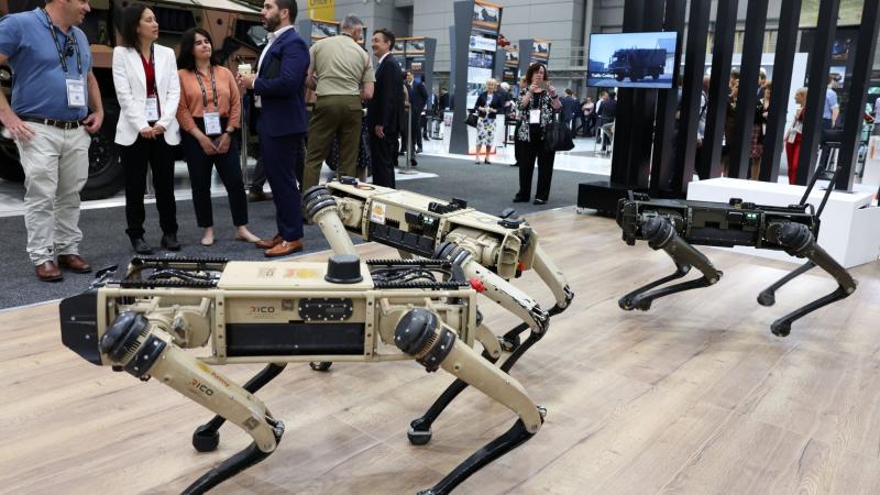 Ghost Robotics Vision 60 Quadrupedal Uncrewed Ground Vehicles are displayed at the 2022 Land Forces expo. Photo: Warrant Officer Class Two Max Bree