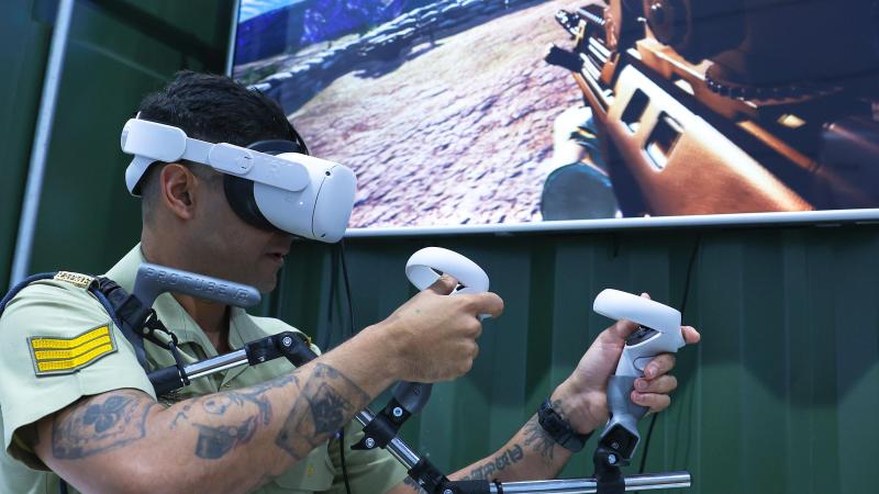Sergeant Nitin Biswas operates virtual reality equipment at the 2022 Land Forces expo. Photos: Warrant Officer Class Two Max Bree