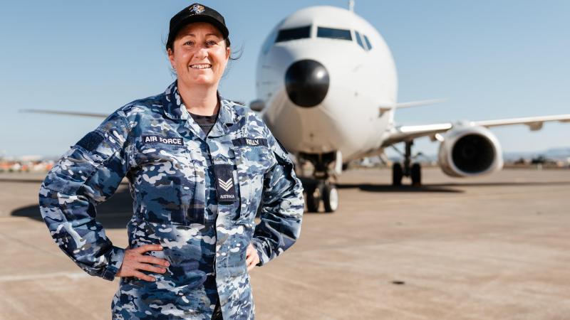 RAAF logistics specialist Sergeant Sheridan Kelly stands in front of a RAAF P-8A Poseidon maritime patrol aircraft in Italy, during Operation Sea Guardian 2022. Photo: Corporal John Solomon