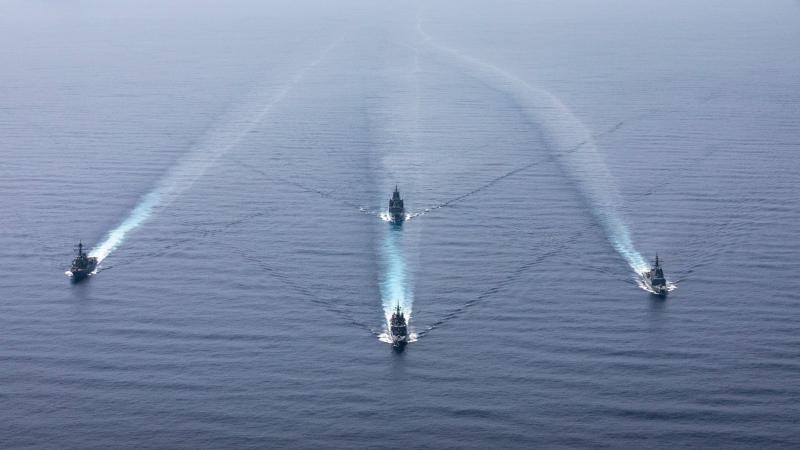 HMA Ships Hobart and Stalwart, Japan Maritime Self-Defense Force Ship Kirisame and US Navy Ship Milius in the South China Sea. Photo: Leading Seaman Daniel Goodman