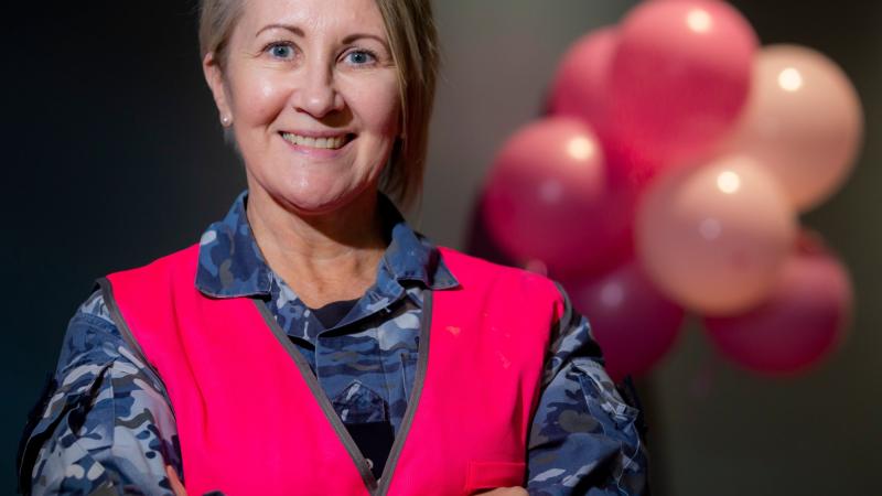 Flight Sergeant Gail Blizzard is a breast cancer survivor who is passionate about raising funds for cancer research. She organised the Pink Ribbon drive-through breakfast event held at RAAF Base Williamtown, NSW. Photo: Corporal Melina Young