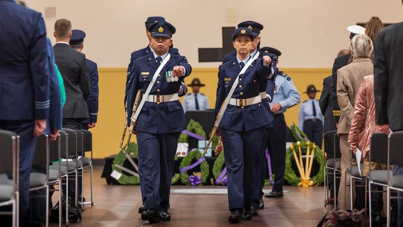 Catafalque party members from No. 1 Remote Sensor Unit march from their post at the conclusion of the Battle of Britain commemoration ceremony at Torrens Parade Hall, Adelaide. Photo: Leading Aircraftman Sam Price