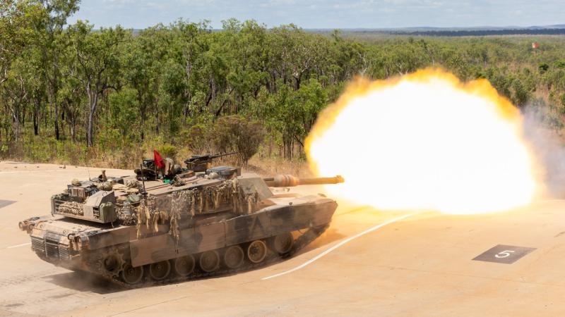 An M1A2 Abrams tank fires its main armament at the Mount Bundey training area in the Northern Territory during Exercise Predators Run. 