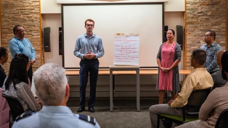 Corporal Carlos Linares Fernandez, left, Flying Officer Marco Kall, Leading Aircraftwoman Sonia Gomez Lopez and Sergeant Yuhang Ding participate in a workshop held at Brindabella Park, Canberra. Photo: Leading Aircraftman Adam Abela