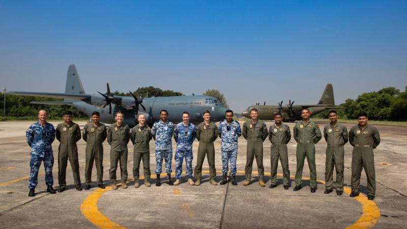 C-130J Hercules aircrew from the Bangladesh Air Force and the Royal Australian Air Force in front of their respective aircraft at BAF Base Bangabandhu, Dhaka during Indo-Pacific Endeavour. Photo: Sergeant David Said