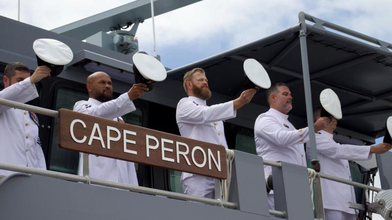 The ship's company of Australian Defence Vessel Cape Peron, 'cheer-ship' during an official welcome to home port HMAS Cairns. Photos: Seaman Lauren Pugsley