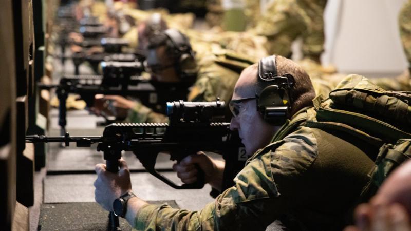 Captain Harrison Keynes from 17th Sustainment Brigade undertakes Combat Marksmanship Continuum at the Weapon Training Simulation System facility at Holsworthy Barracks. Photo: Captain Thomas Kaye