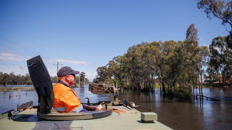  Local State Emergency Service and Country Fire Authority conduct route reconnaissance of flood affect areas in Echuca, in an Army Bushmaster protected mobility vehicle. Photo: Corporal Cameron Pegg
