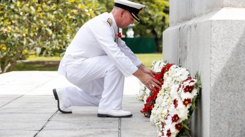 Maritime Task Group Commander Commodore Mal Wise lays a wreath at the Cenotaph War Memorial Park in Singapore. Photo: Sittachai Sakonpoonpol