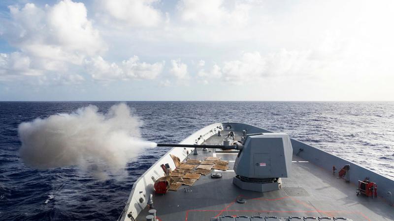 HMAS Hobart fires its five-inch gun during a live-fire exercise as a part of Exercise Keen Sword 2022. Photos: Leading Seaman Daniel Goodman