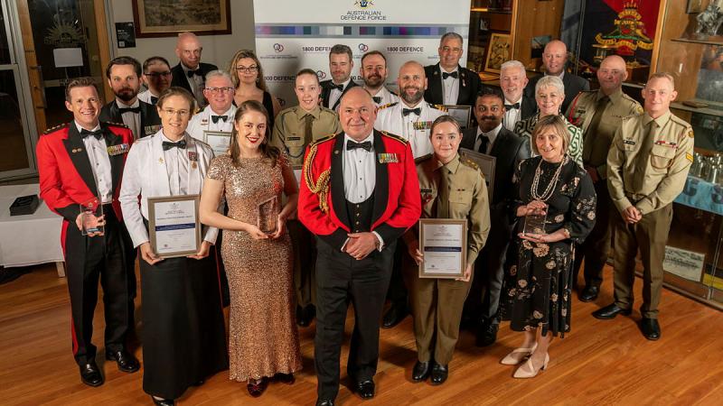 Major General Douglas Laidlaw poses with winners of Defence’s annual National Employer Support Awards at a formal dinner held at Gallipoli Barracks, Enoggera. Photo: Private Michael Currie