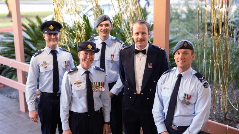 1 Security Forces Squadron logistic section celebrating their squadron's 80th anniversary. Photo: Aircraftman Bailey Morgan-Brinkworth