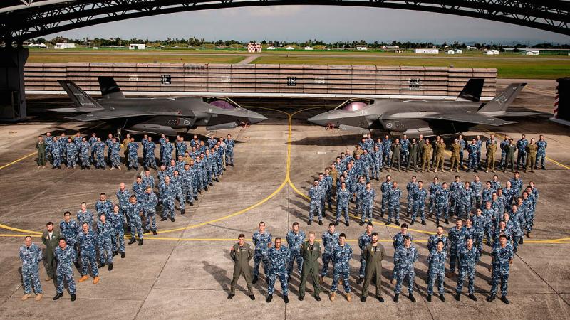 Personnel from 75 Squadron in front of two F-35A Lightning II at RMAF Base Butterworth, Malaysia. Photos: Leading Aircraftman Adam Abela