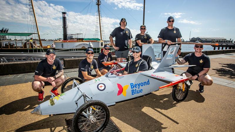 26 Squadron mechanical equipment operations maintenance section team with the F/A-18 Hornet billy cart near the Newcastle foreshore. Photos: Corporal Melina Young
