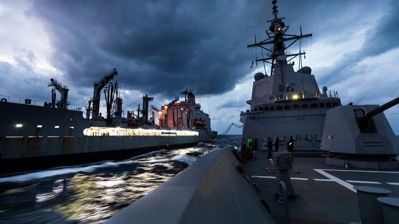 USNS Rappahannock, left, conducts a Replenishment at Sea with HMAS Hobart during Exercise Keen Sword.