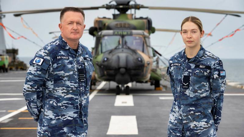 Wing Commander Peter Milier, left, and Leading Aircraft-woman Carly Best are two of the 20 RAAF members serving on board HMAS Adelaide for Indo-Pacific Endeavour 2022. Photo: Leading Seaman Sittichai Sakonpoonpol