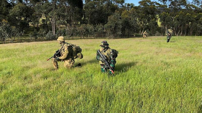 Cadets from the Royal Military College-Duntroon and Indonesian Army exercise patrol tactics at Puckapunyal military training area. Photos: Major Michael Kiting