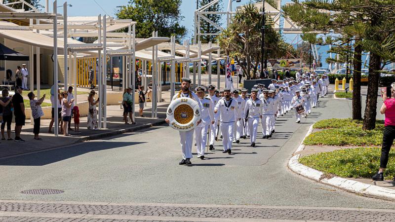 Commanding Officer 816 Squadron, Commander Lee Pritchard and members of 816 squadron march through the streets of Caloundra. Photos: Able Seaman Benjamin Ricketts