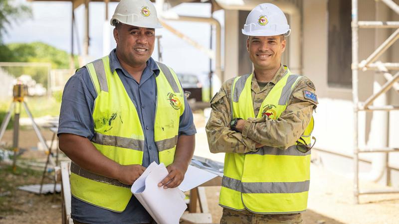 Australian Army engineer Captain Lachlan Attard, right, with site supervisor Mr John Tokataake at the Vanuatu Police Force's Cook Barracks redevelopment site in Port Vila. Photo: Corporal Jonathan Goedhart