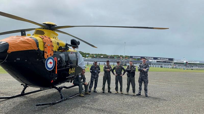723 Squadron representatives get their EC-135 training helicopter ready ahead of a big weekend supporting the World Superbike Championship at Phillip Island. 