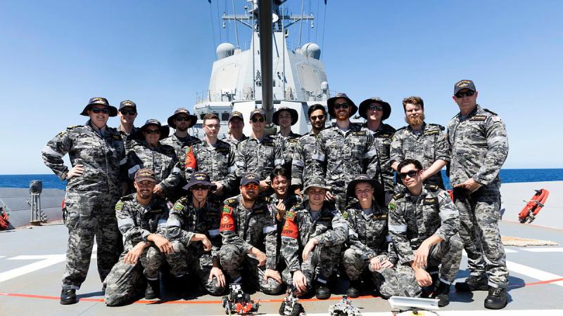 Electronics technicians on-board HMAS Hobart on completion of the Robot Wars competition. Photo: Leading Seaman Daniel Goodman