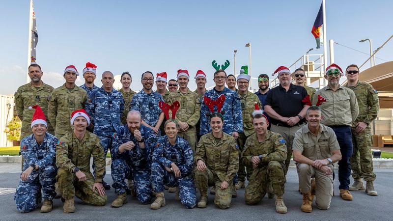 Australian Defence Force and Australian Public Service personnel serving with Headquarters Middle East at Camp Baird. Photo: Corporal Jacob Joseph