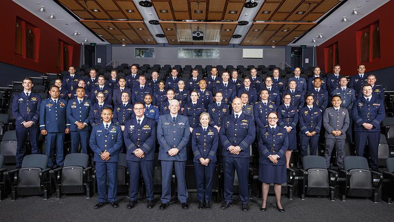 Graduates from Air Force, having completed the year-long Australian Command & Staff Course, pose for a group photo.