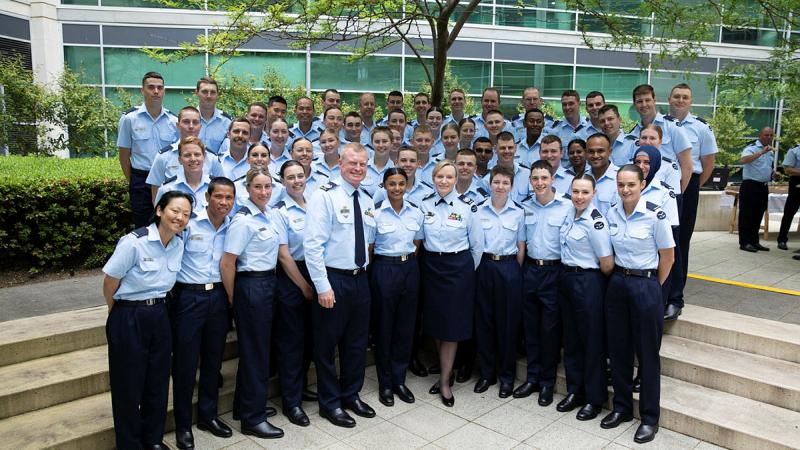 Recruit Course 18/22 with the new Warrant Officer of the Air Force, WOFF-AF Ralph Clifton, and his predecessor, WOFF-AF Fiona Grasby, at the changeover ceremony in Canberra. 