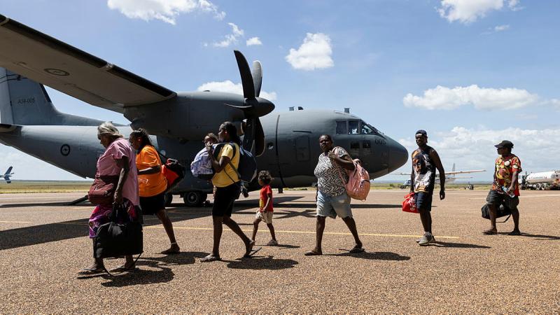 A RAAF C-27J Spartan aircraft conducts an evacuation from Fitzroy Crossing in the Kimberley Region. Photos: Leading Seaman Jarrod Mulvihill