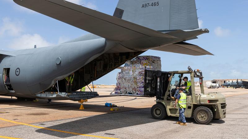 Pallets of dry stores are loaded onto a C-130J Hercules aircraft bound for Derby in the Kimberley Region where heavy rainfall from Ex-Tropical Cyclone Ellie has isolated communities. Photo: Leading Seaman Jarrod Mulvihill.