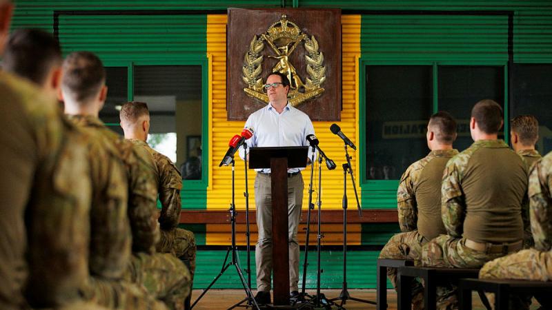 Defence Personnel Minister Matt Keogh speaks with Australian Army soldiers from the 5th Battalion, Royal Australian Regiment. Photo: Corporal Dustin Anderson