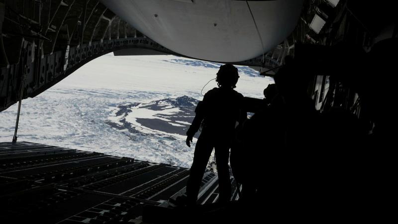 A Royal Australian Air Force C-17A Globemaster prepares to airdrop construction and camp equipment and stores to Bunger Hills, Antarctica, as part of Operation Southern Discovery. Photo: David Knoff