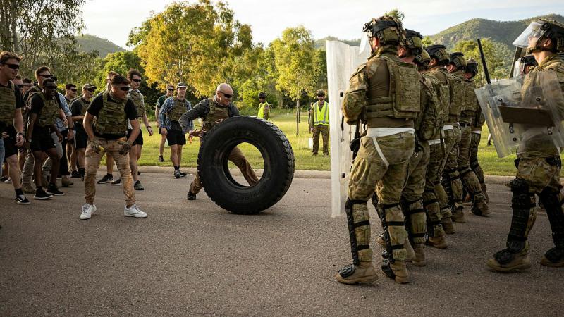 Army soldiers from 3rd Battalion, The Royal Australian Regiment and the 1st Military Police Battalion defend against role players as part of a Readiness Protection Course. Photos: Bombardier Guy Sadler