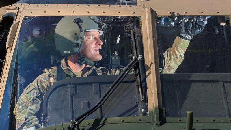 Lieutenant-Colonel Scott Dore conducts pre-flight checks on an Afghan National Army UH-60 Black Hawk at Kandahar Airfield, Afghanistan in 2019. Photo: Corporal Chris Beerens