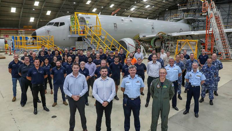 Members of the first P-8A Poseidon Depot Maintenance at RAAF Base Edinburgh including front row, from left, Boeing Defence Australia, Mr Ben Knabe; Boeing Defence Australia P-8A Program Manager, Mr David Kleinitz; Director Strategic Contracting, Group Captain James Blagg and Officer Commanding 92 Wing, Group Captain Paul Carpenter. Photo: Corporal Brenton Kwaterski