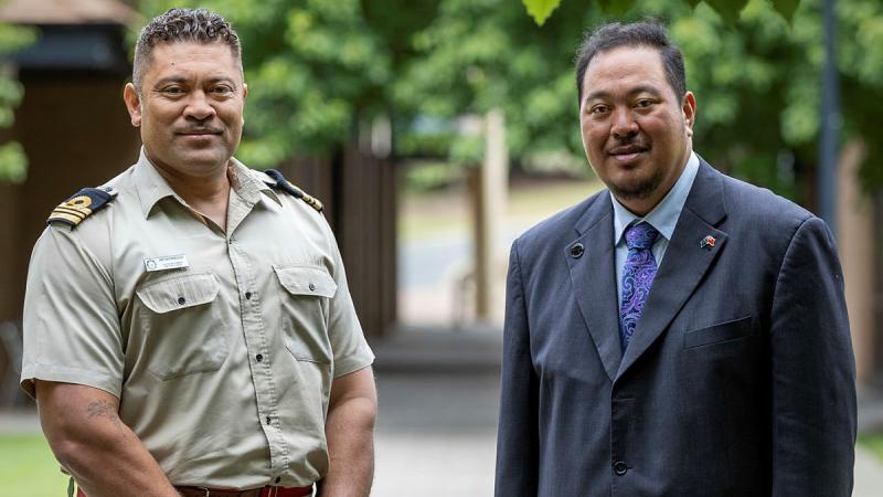  His Royal Highness Crown Prince Tupouto'a ‘Ulukalala, from the Kingdom of Tonga, right, stands with current student Lieutenant Commander Ametisi Fonokolafi at the Australian Defence College, Canberra. Photos: Corporal Jacob Joseph 
