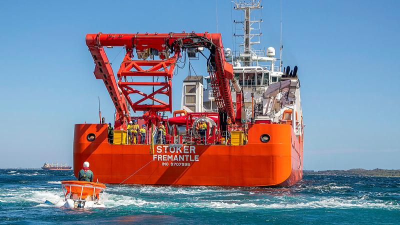 Industry partner JFD's LR5 being retrieved by the Merchant Vessel Stoker during Exercise Black Carillon off the coast of WA. Photos: Leading Seaman Ernesto Sanchez
