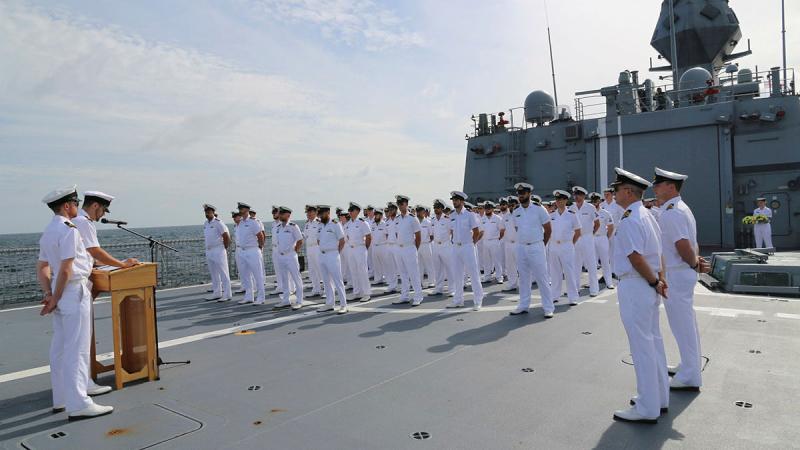 HMAS Perth III crew gathered on the flight deck to commemorate the losses of Perth I and USS Houston in 1942. Photo courtesy HMAS Perth III