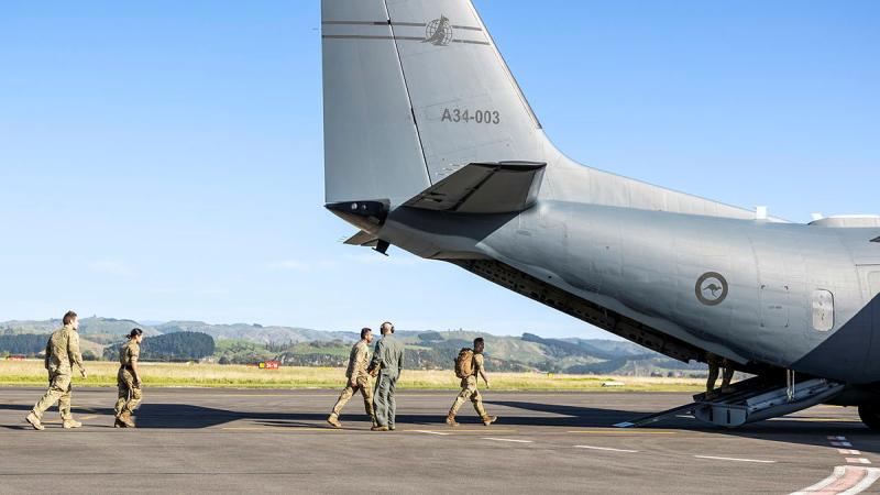 New Zealand Army personnel embark a RAAF C-27J Spartan to assist a remote community affected by Tropical Cyclone Gabrielle. Photo: Leading Seaman Nadav Harel