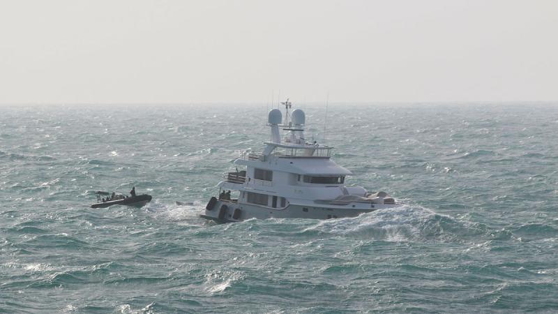 HMAS Hobart’s rigid-hulled inflatable boat team rescue mariners from MY Vivierae II off the coast of northern Australia.