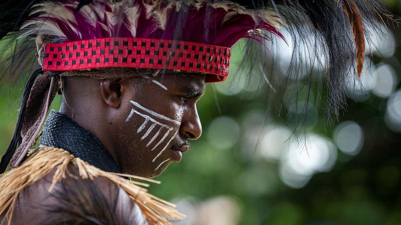 An Australian Army soldier from Sarpeye Company, 51FNQR dressed in traditional Torres Strait Islander clothing during the Torres Strait Island Light Infantry Battalion 80th anniversary ceremony. Photo: Leading Seaman Leo Baumgartner
