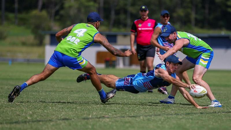 Flight Lieutenant David Murray splits the defence in a desperate dive for the line against ACT Raiders.