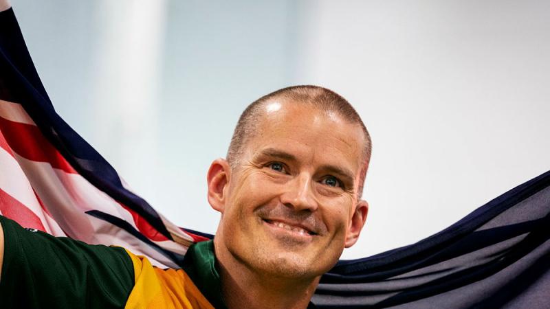Team Australia competitor Flight Sergeant Nathan King celebrates after placing third in the men’s ISD 50m backstroke event held at the Invictus Games in 2020. Photo: Sergeant Oliver Carter