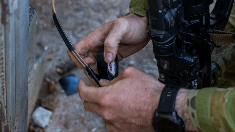 An Australian Army soldier prepares an explosive charge during an urban breaching serial at Townsville Field Training Area. Photo: Sergeant Brodie Cross